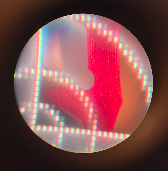 View through the eyepiece with a white crosshair